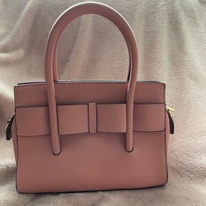 Adorable pink purse with bow detail